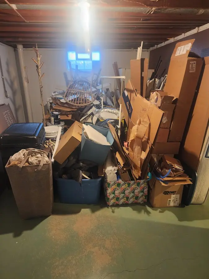 Roll-off dumpster container at job site for 20 Yard Dumpster Rental in Winter Park